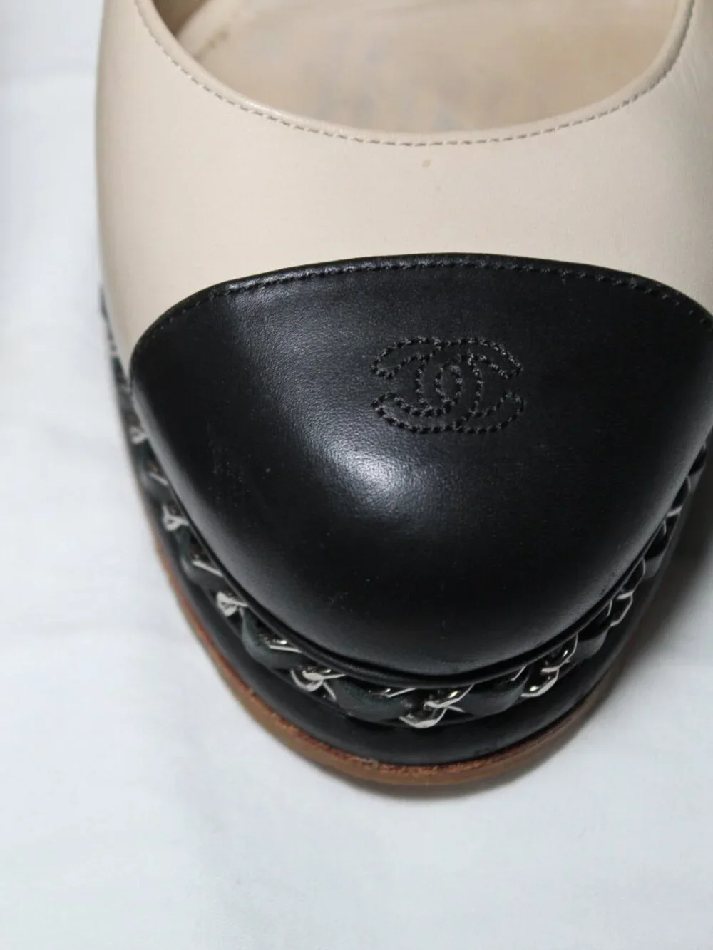 Chanel Two Tone Leather Tan Black Toe CC Cap Heels Pumps Chain Detail 40